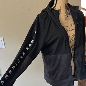 American Rag Black and Charcoal Hooded Zip Jacket with Arm Script